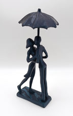 Statua Surrealista Amore sotto l'Ombrello