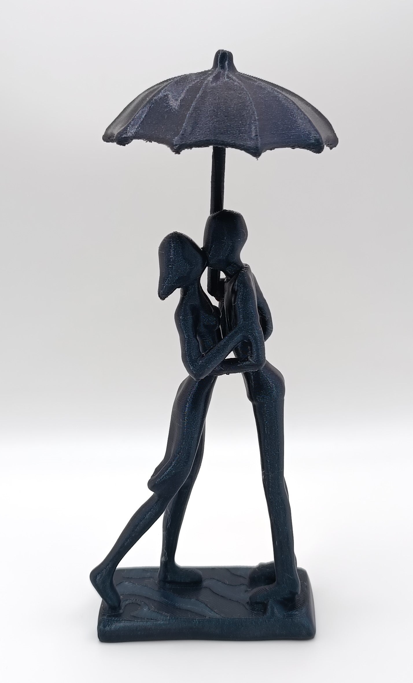 Statua Surrealista Amore sotto l'Ombrello